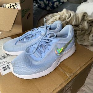 Holographic Nike tennis shoes